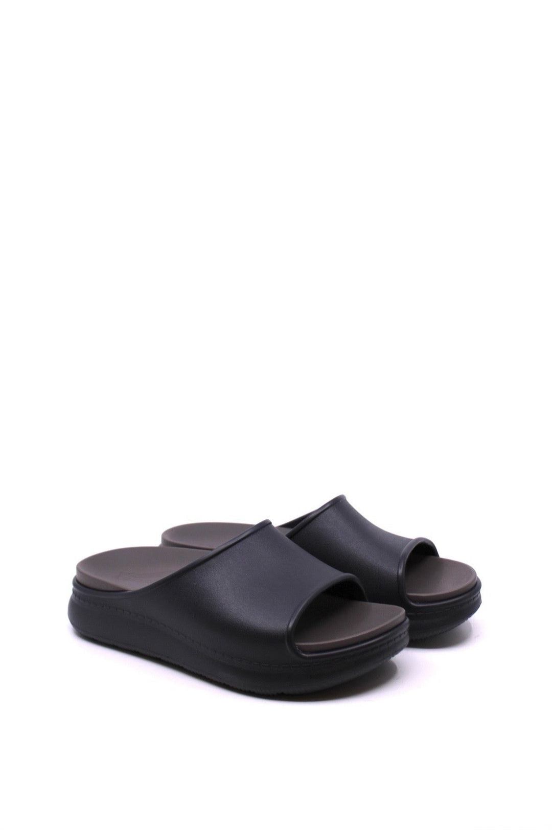  cushioned, supportive slide is an easy slip-on style in black made from light Eva rubber from dansko