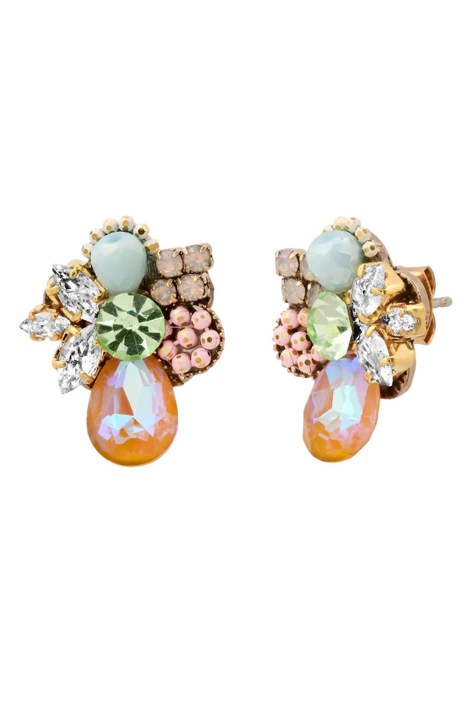 Pair of ornate earrings with gemstones on a white background