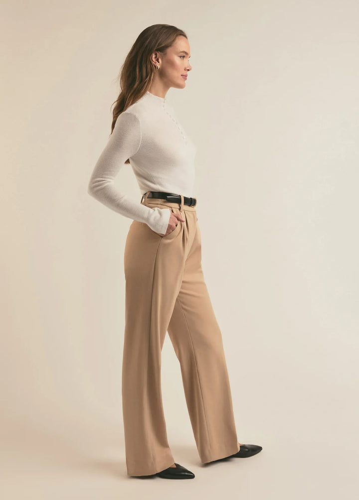 Favorite Daughter Jackie Sweater side view- Dear Lucy
White ,half button up, tight fitting long sleeve shirt in a sweater material with a mock neck.