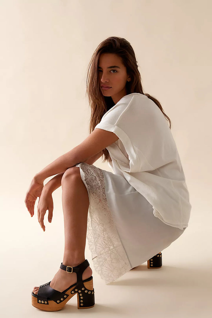 Free People Cecily Studded Clog Black - Dear Lucy
Platform, heeled clog with a wooden base and black leather upper toe strap and ankle strap with studding throughout. 