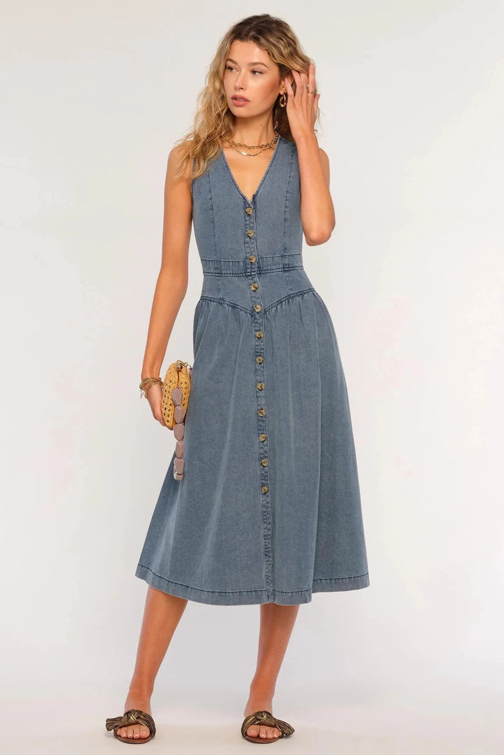 Heartloom Jaime Dress  front view- Dear Lucy
Soft denim midi dress featuring a button front, v neck-line, and flare bottom. 