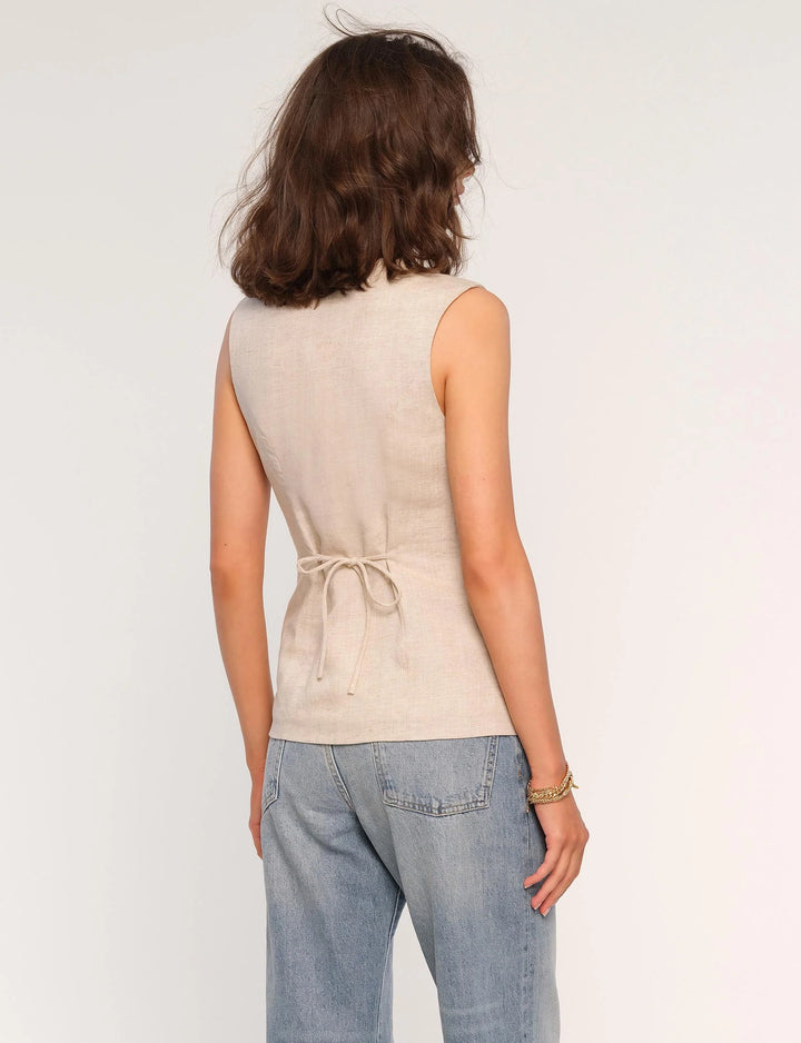 Heartloom Josette Vest back view- Dear Lucy Button-front vest with a high neckline, front pockets, and a back tie for a synched waist. 