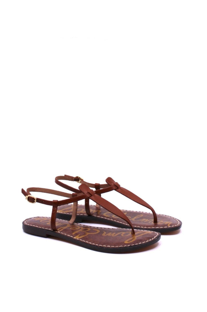 Sam Edelman GiGi Kona Brown side view - Dear Lucy Featuring slim leather straps, a classic thong silhouette, and a lightly cushioned footbed,