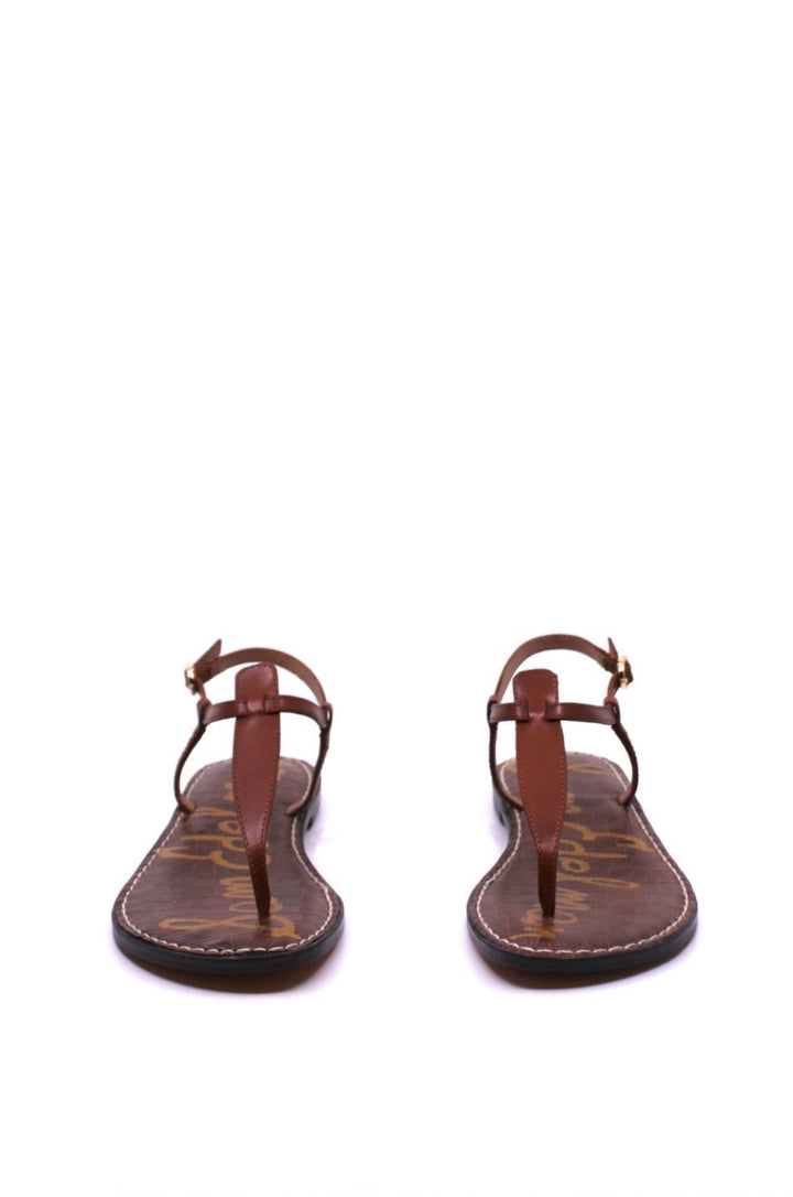 Sam Edelman GiGi Kona Brown front view - Dear Lucy Featuring slim leather straps, a classic thong silhouette, and a lightly cushioned footbed,