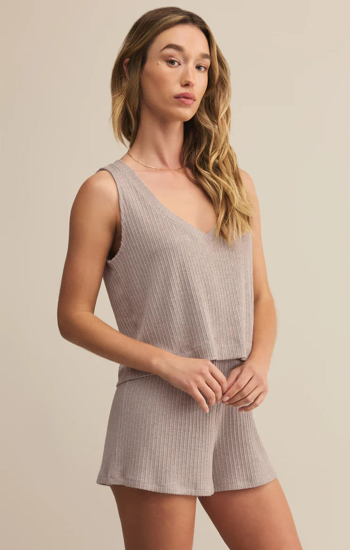 The Sloane V-Neck Rib Tank by Z Supply in Slate Grey is a must-have for your fall lounge lineup. Crafted from ultra-soft ribbed knit, this relaxed-fit tank features a flattering v-neckline and a versatile neutral tone that pairs effortlessly with your favorite cozy layers.