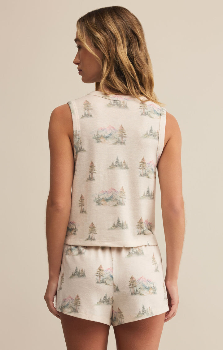 The Warmer Days Road Trip Tank by Z Supply is the perfect piece to ease into fall while holding on to summer’s spirit. This soft brushed tank features an allover scenic print of pastel trees and mountains, bringing a dreamy, outdoorsy feel to your lounge look.