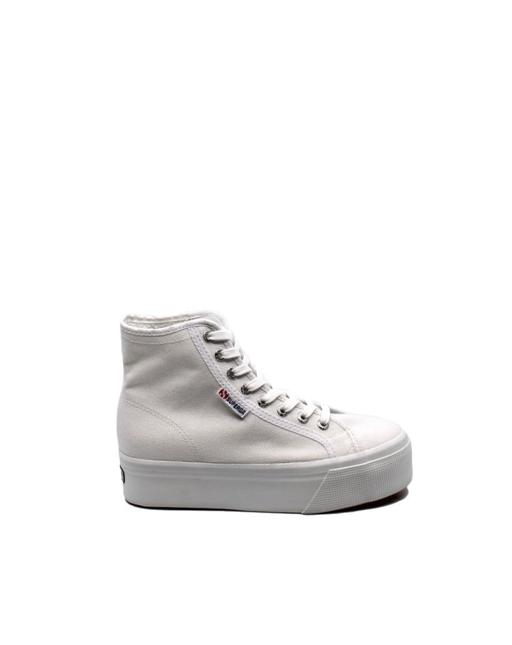 Superga 2708 Platform Hi Top White - Dear Lucy Level up any outfit with the Superga 2708 Platform Hi Top in white. This sneaker is the perfect classic hi top for any casual day, with a woven canvas outer and a cushioned 1.75" rubber platform sole.&nbsp;