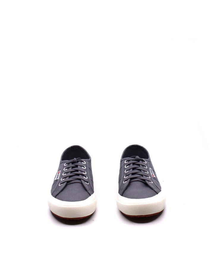 Superga 2750 Cotu Classic Grey Bluish - Dear Lucy Sturdy cotton unlined canvas upper
Lace-up closure with metal eyelets for an adjustable fit
Loop signature tag at side
Cushioned footbed provides sustained comfort for all-day wear
Natural rubber, crepe-textured outsole offers traction and durability
Platform measures approximately 1" high
